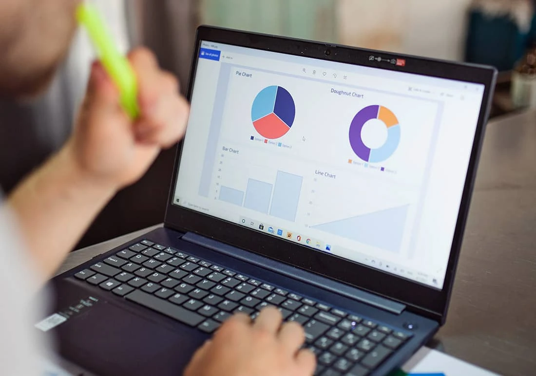 Reviewing project information on a laptop